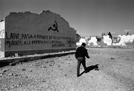 Grafitti on a wall in Jauja, Junín, 1989, 'LAIVE, [Food company that specializes in Dairy products] PASS IT INTO THE HANDS OF ITS RIGHTFUL OWNERS: THE PEASANTS... DEATH TO THE EXPLOITATIVE SEMI-FEUDAL COMPANY (SAIS)!